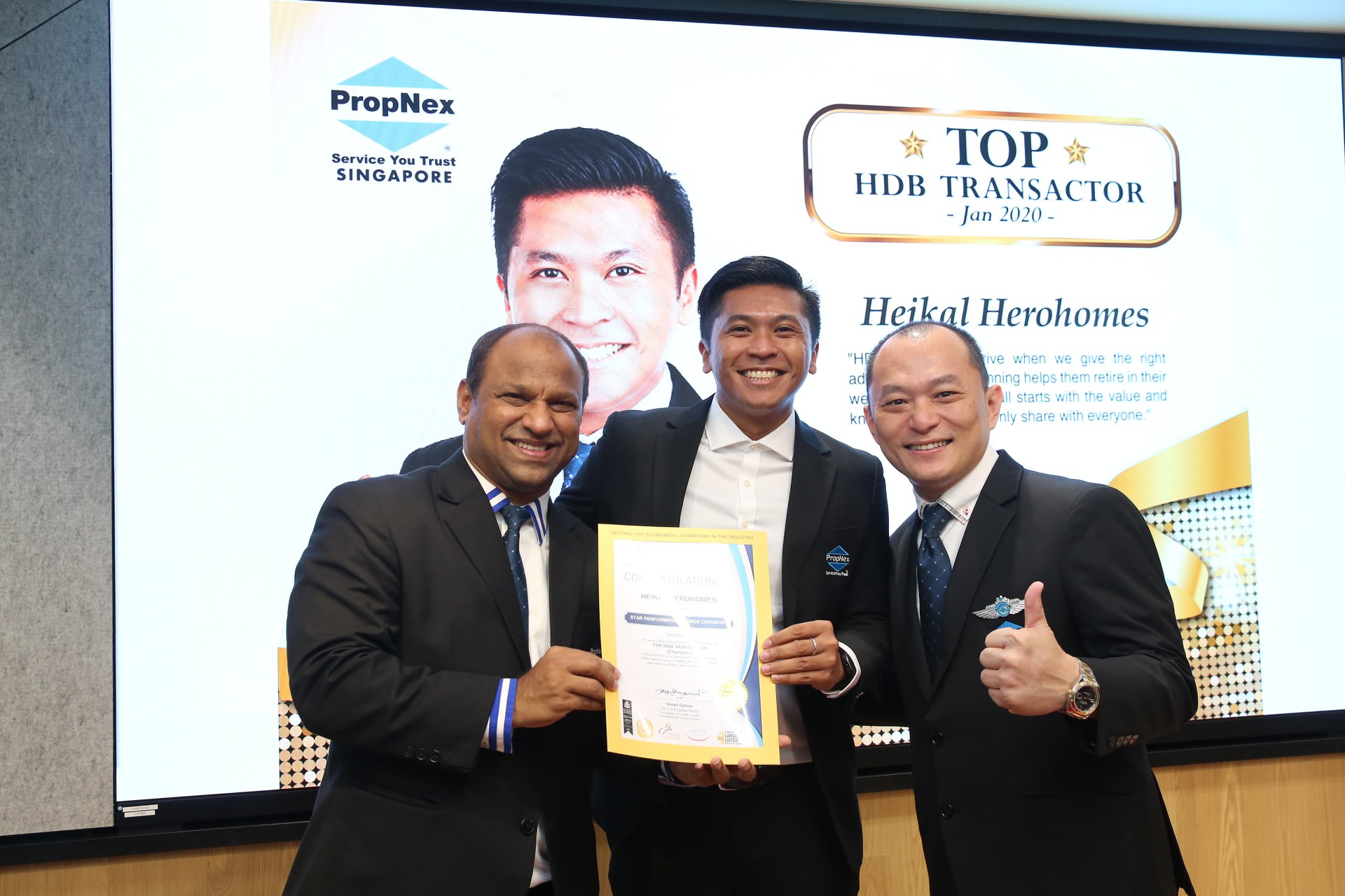 Heikal Shafrudin receiving the Top HDB Transactor Award, 2020